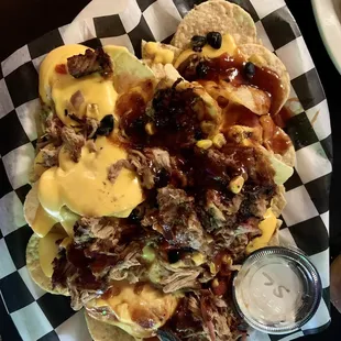 Pork nachos So much cheese and pork! Ask for sour cream and extra bbq