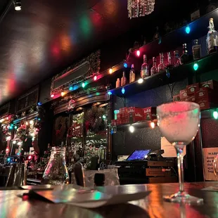 a bar with colorful lights