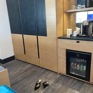 Hidden closets, mini bar and Nespresso coffee maker