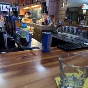 a glass of water on the bar