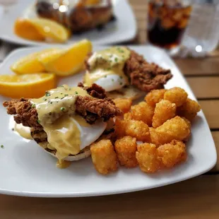 Chicken tenders served on English muffin, poached eggs and hollandaise sauce, amazing