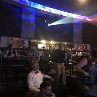 The bar and tables in the back