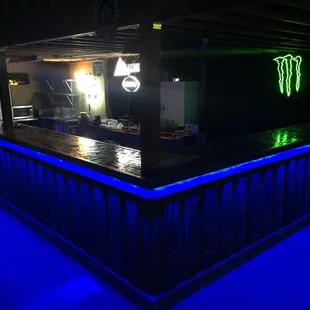 a bar with neon lights