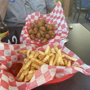 Basket of fries and fried mushrooms