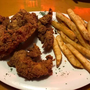 Delicious chicken tenders with those amazing fries!