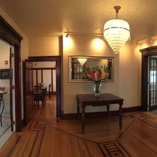 a hallway leading to a dining room