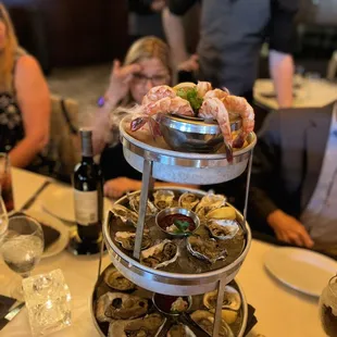 a three tiered display of seafood