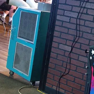 They have a portable AC unit inside not vented to outside because the owner is to much of a cheap ass.