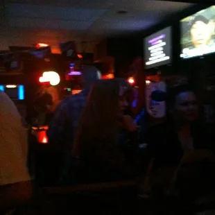 a group of people at a bar