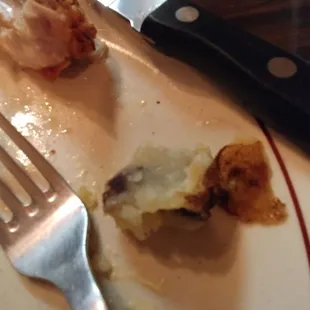 LARGE ROTTEN spot on the baked potato