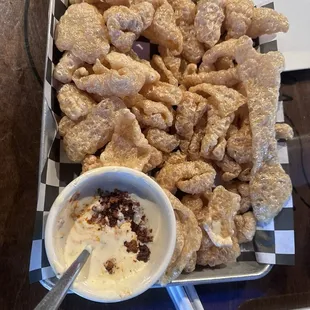Chicharonne and queso