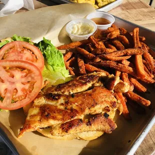 Grilled chicken sandwich with sweet potato fries