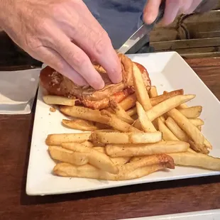 Chicken Parmesan sandwich with fries