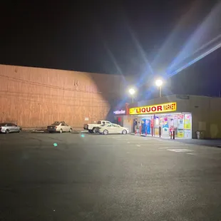 The place is in the corner next to the liquor