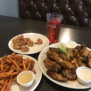 Shrimp, teriyaki and lemon pepper wings with sweet potato fries and Ginger ale with grenadine 6 cherries