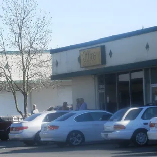 cars parked in front of the building