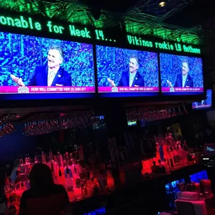 a television screen with two men on it