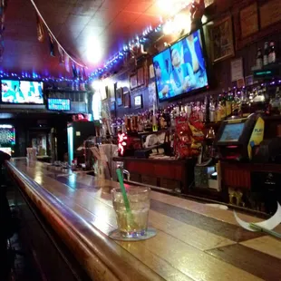 a glass of water on the bar