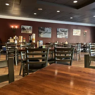 Dining area w/ partial view of beverage service area that included, ice water, hot tea, hot coffee, fruit juice, condiments,ect...