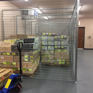 a forklift and pallets of boxes