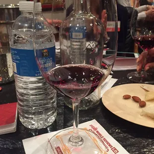 a glass of wine and cheese