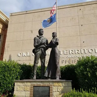 Statue of the wedding the took place on Carnegie Library steps between Miss Indian Territory and Mr Oklahoma Territory.