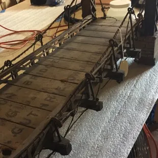 Patent model suspension bridge over the Skeleton Creek.