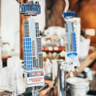  tall building on a beer tap