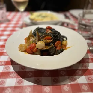 Squid ink Pasta with scallops and clams
