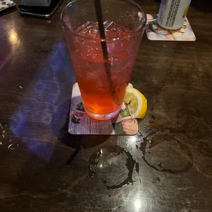 a drink in a glass with a straw