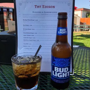 a cold drink and a menu