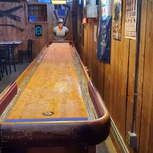 Really long shuffleboard table. They had 2 of these.