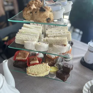 Cucumber sandwich, ham and mustard sandwich and coronation chicken sandwich.   Assorted pastries and sweets and amazing scones.