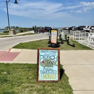 a sign on the sidewalk