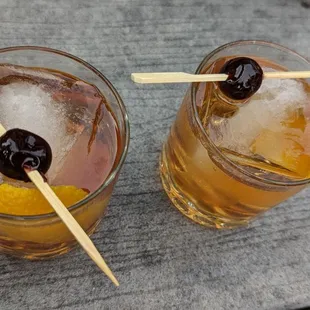 two glasses of old fashioned cocktails