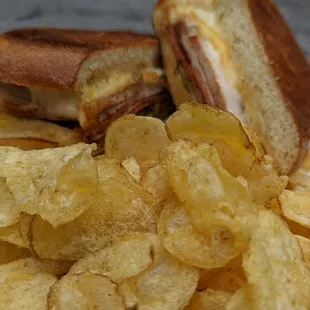 a sandwich and chips on a plate