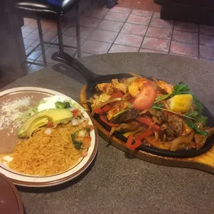 Fajita trio with rice and beans