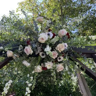 Beautiful flowers to accent the wedding arch
