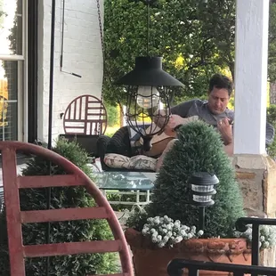 The Liberty Suite's porch. Nice place for breakfast and relaxing. Bring your guitar. Others have.