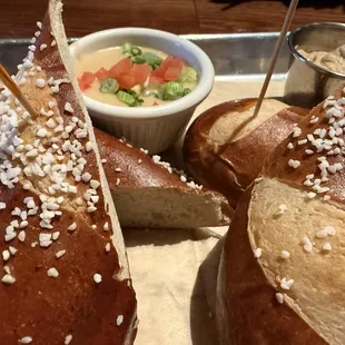 Salty pretzels with cheese and mustard.