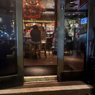 people sitting at a bar