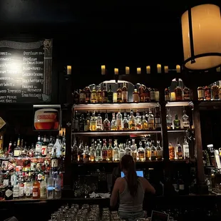 a woman at the bar