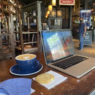 Tiff&apos;s Treat white chocolate macadamia nut cookie, Rose Latté and a view