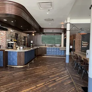 Entrance to the left it's the small coffee station