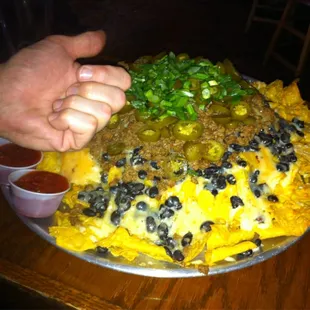 Full order of Macho Nachos.  This will feed a family of 4 and a large pack of wild dogs.