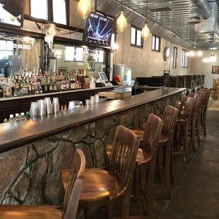 Bar to your left as you enter the build9ng