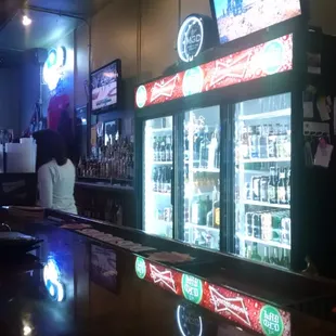 a man standing at the bar