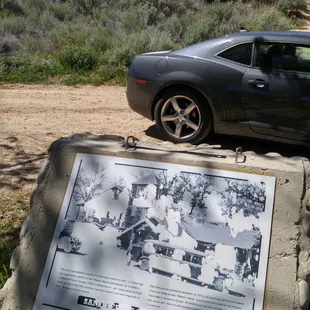 Informative sign along the road. Mostly worn away though. But still legible.