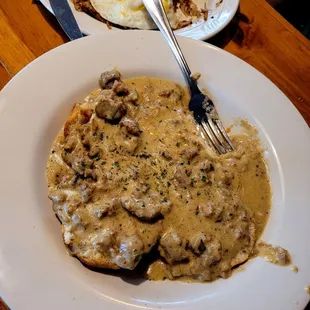 Biscuits (2) and gravy w/ sides of 2 eggs, toast, hash browns. There is also a choice of meat (bacon, sausage, or ham) $12.00