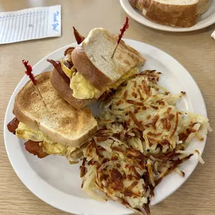 BEC (bacon + egg + cheese) on sourdough with hashbrowns